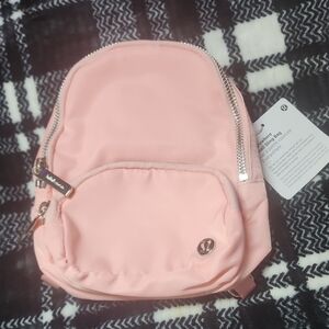 lululemon athletica Light Pink Small Sling Bag with Silver Zippers